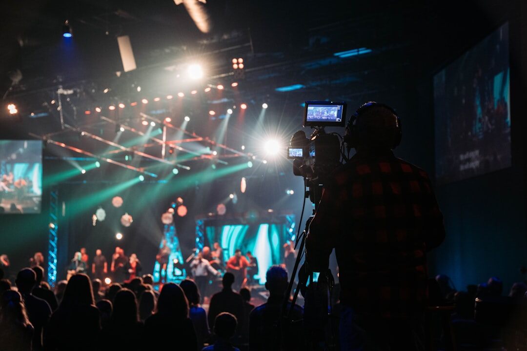 Camera operator streaming a live broadcast at an event